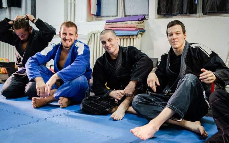 adults waiting to spar at BJJ class in San Antonio